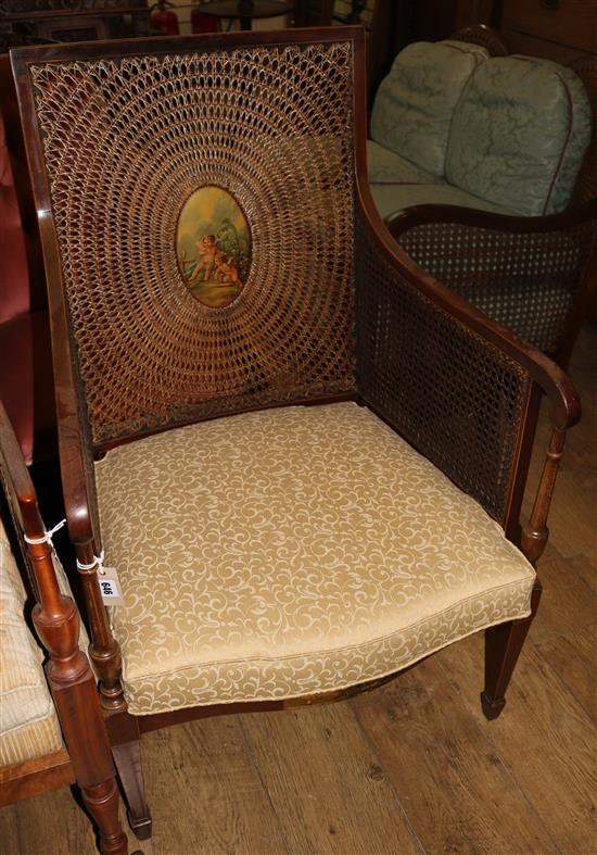 An Edwardian painted mahogany bergere armchair, H.3ft 4in.